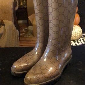 Gucci Rain-boots size 36. USA 6. These Gucci logo boots are in good condition.